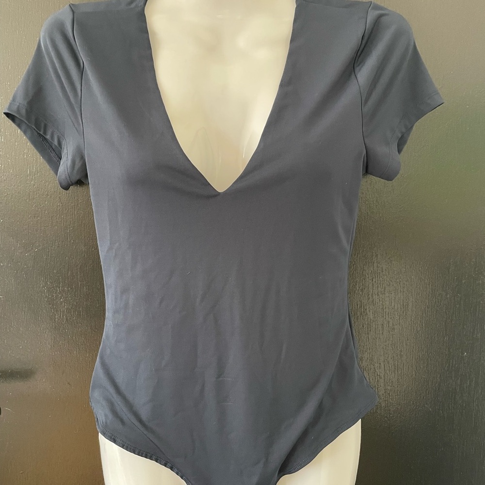 2/$10 Dynamite V-Neck Body Suit